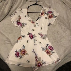 Charlotte Russe Trixxi White Floral Romper - Small